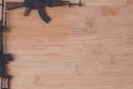 Toy gun Model guns figure on wood background for write board Royalty Free Stock Photo