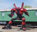 The figure of a transformer made of metal waste