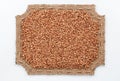 Figured frame of burlap with buckwheat grains