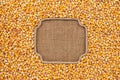 Figured frame made of rope with corn grains on sackcloth Royalty Free Stock Photo