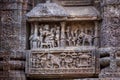 Figures of ancient Hindu King and his consorts at the royal court at Sun Temple Complex, Konark, India. Royalty Free Stock Photo