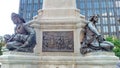 Figures at the base of the statue of Paul Chomedey de Maisonneuve