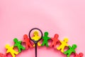 Figures of people on pink desk top view. Human resources, hiring and recruitment concept copy space