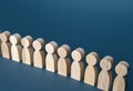 Figures of people in a row. Society, demography. Selection concept, choice. Search for new employees workers, hiring for work. Royalty Free Stock Photo