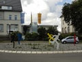 Figures of running persons as a marking of roundabout in Fritz Kiehn Platz square. Trossingen, Germany