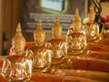 Figures of the sitting Buddha in the Wat Saket Temple or Golden mount, Bangkok, Thailand Royalty Free Stock Photo