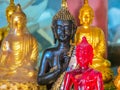 Figures of the sitting Buddha in the Wat Saket Temple or Golden mount, Bangkok, Thailand Royalty Free Stock Photo