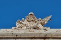 Figures of winged women of the Lorenzana University Palace in Toledo, Spain