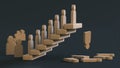 figures of wooden men in line rise up the stairs and fall down. Variation of success and failure. Royalty Free Stock Photo