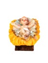 Figurine of baby Jesus Christ in a Christian nativity scene Royalty Free Stock Photo