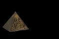 Figurine of bronze egyptian pyramid