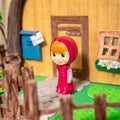 Figurine of character Masha from popular cartoon about Masha and the Bear in hand-made crafts