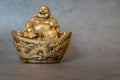 Figurine Cheerful Hotei - Image. Smiling Buddha - Chinese God of Happiness, Wealth and Lucky Isolated on gray - Image