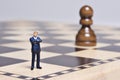 Figurine and chess Royalty Free Stock Photo