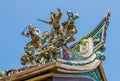 Figurine on the Chinese Temple Roof