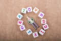 Figurine and the colorful alphabet letter cubes Royalty Free Stock Photo