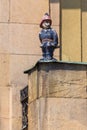 A figurine of a firefighter on the fire station building in Nysa.