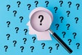 A figurine of a human head and a question mark, Decision-making and life choices. Royalty Free Stock Photo