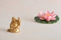 Figurine of a laughing and cheerful golden Buddha Royalty Free Stock Photo