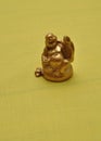 Figurine of a laughing and cheerful golden Buddha Royalty Free Stock Photo