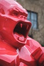 A figurine of Red Gorilla in London united kingdom art statue