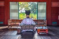 Figurine of a royal clerk at Gwandeokjeong historical complex in center of Jeju city, Republic of Korea