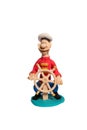 Figurine sailor at the helm