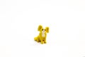 figurine small toy red yellow brown dog on white background isolated object Royalty Free Stock Photo
