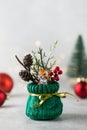 A figurine of a tiger in a Christmas sack against the background of Christmas balls. Chinese New Year concept.