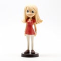 Anime Figurine Of A Girl In Red Top And Pants Royalty Free Stock Photo