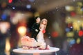 Figurines of the bride and groom on a wedding Royalty Free Stock Photo