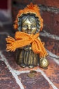 Figurines of the city of Kaliningrad, Homlins, cute modern sculpture of Grandmother Homlin on brick wall of amber museum