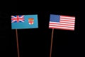 Fijian flag with USA flag isolated on black