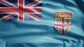 Fijian flag waving in the wind. Close up of Fiji banner blowing soft silk