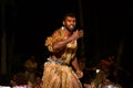 Fijian men dancing a traditional male dance meke wesi in Fiji