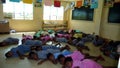 Fijian school class sleeping on the ground