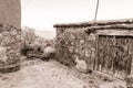 Fikardou village scene with blooming almond trees- sepia toned Royalty Free Stock Photo