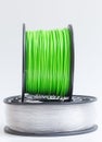 Filament for 3D Printer crystal clear and bright green against a Royalty Free Stock Photo