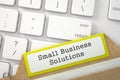 File Card with Inscription Small Business Solutions. 3D. Royalty Free Stock Photo