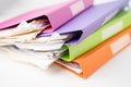 File Folder Binder stack of multi color on table in office Royalty Free Stock Photo