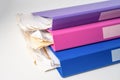 File Folder Binder stack of multi color on table in office Royalty Free Stock Photo