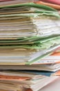File mountains on a desk in the office as a symbol of much work Royalty Free Stock Photo