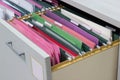 Files document of hanging file folders in a drawer in a whole pile of full papers Royalty Free Stock Photo