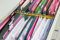 Files document of hanging file folders in a drawer in a whole pile of full papers Royalty Free Stock Photo