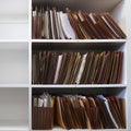 Files Organized on Office Shelf For Clients Papers and Information Royalty Free Stock Photo