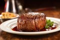 filet mignon covered in thick barbecue sauce on plate Royalty Free Stock Photo