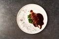 Filet mignon with mashed potatoes and pomegranate sauce, close-up Royalty Free Stock Photo