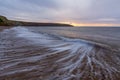 Filey seascape with wave trails, slow shutter to show the waves movement.