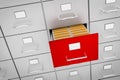 Filing cabinet with yellow folders in an open drawer