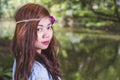 Filipina woman with a garden bokeh